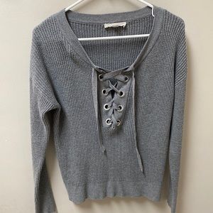 Lovestich brand. Lightly worn. Size small.